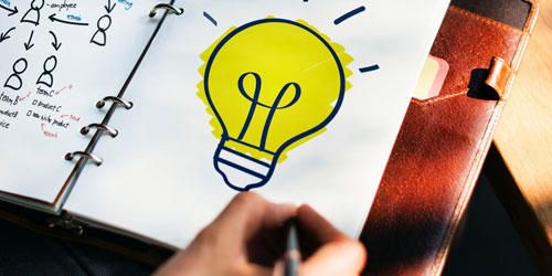 highlighted light bulb drawn in journal